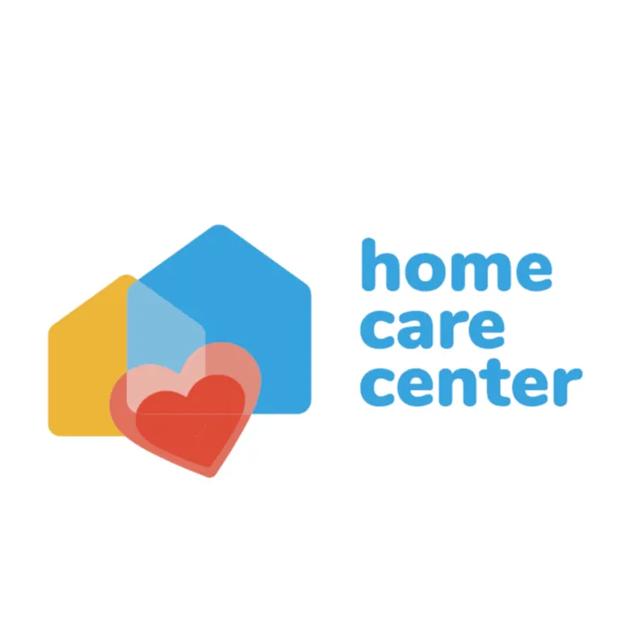 Uma ilustração minimalista e colorida que representa dois formatos de casa e um coração, simbolizando lar, cuidado ou bem-estar.

O objeto principal é composto por duas formas geométricas de casa (silhuetas de casas simples com telhados triangulares).

Uma casa, menor e em amarelo-alaranjado, está posicionada ligeiramente à esquerda e atrás.

A outra casa, maior e em azul brilhante, está à direita e ligeiramente à frente.

Na frente e no centro da imagem, sobrepondo parcialmente as duas casas, há um grande coração vermelho. Ele tem uma sobreposição transparente ou uma segunda camada de coração em um tom de rosa - claro ou vermelho mais suave, dando um efeito de profundidade ou brilho.