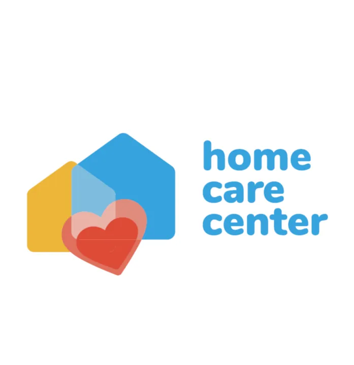 Uma ilustração minimalista e colorida que representa dois formatos de casa e um coração, simbolizando lar, cuidado ou bem-estar.

O objeto principal é composto por duas formas geométricas de casa (silhuetas de casas simples com telhados triangulares).

Uma casa, menor e em amarelo-alaranjado, está posicionada ligeiramente à esquerda e atrás.

A outra casa, maior e em azul brilhante, está à direita e ligeiramente à frente.

Na frente e no centro da imagem, sobrepondo parcialmente as duas casas, há um grande coração vermelho. Ele tem uma sobreposição transparente ou uma segunda camada de coração em um tom de rosa - claro ou vermelho mais suave, dando um efeito de profundidade ou brilho.