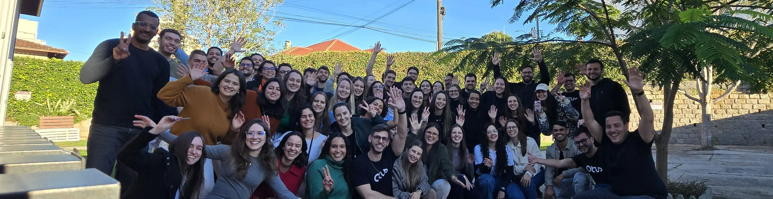 Time reunido no planejamento estratégico realizado a cada quarter para alinhar os objetivos com o time